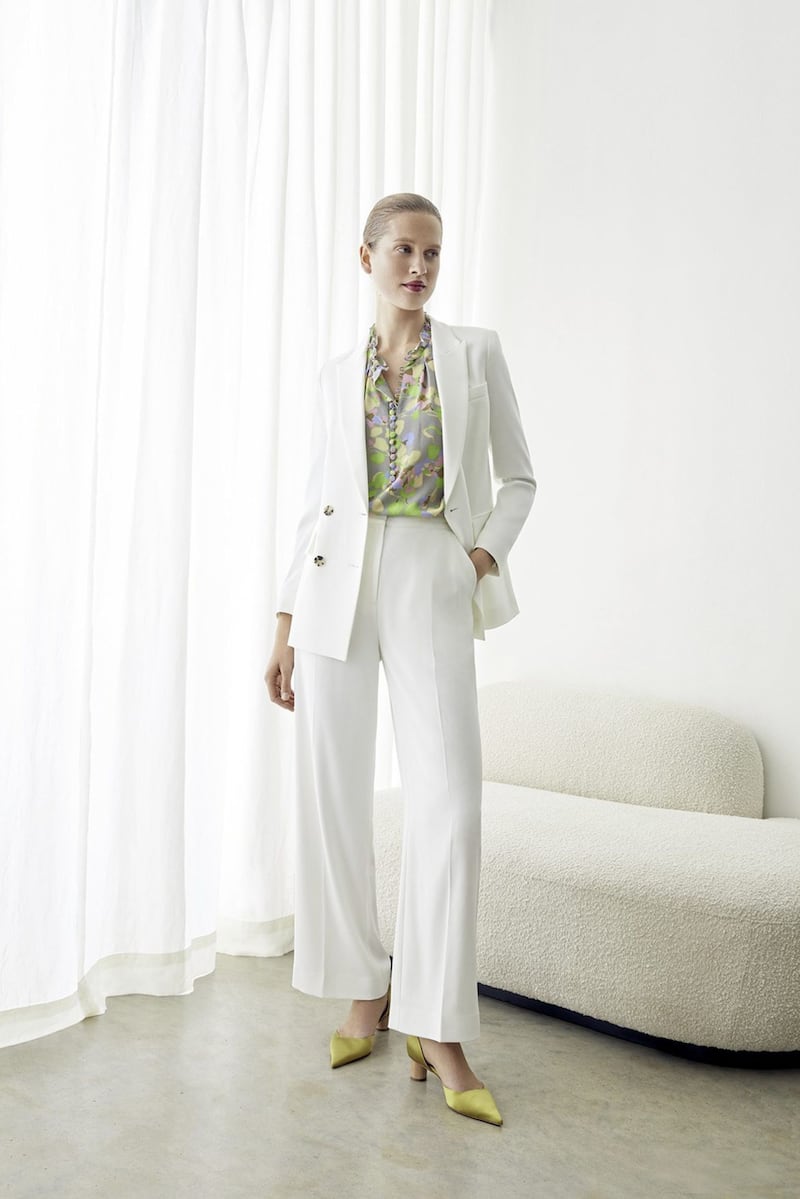 The Fold Clever Crepe Almeida Jacket Ivory, &pound;295; Tierney Blouse Watercolour Print Silk, &pound;225; Clever Crepe High Waisted Elasticated Trousers Ivory, &pound;225, available from The Fold