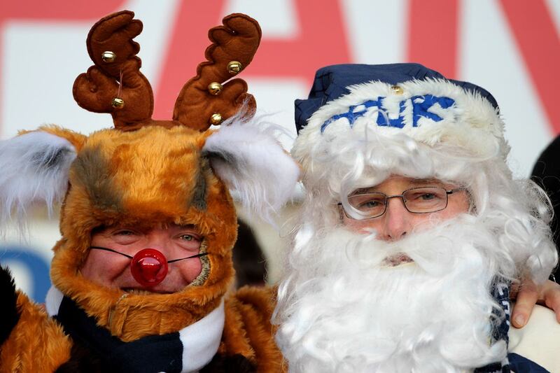 Tottenham fans dressed as Santa and Rudolph