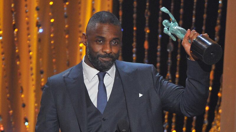 Idris Elba accepts the award for outstanding male actor in a supporting role for Beasts of No Nation at the Screen Actors Guild awards on Saturday night. Pitcure: Vince Bucci/Invision/AP 