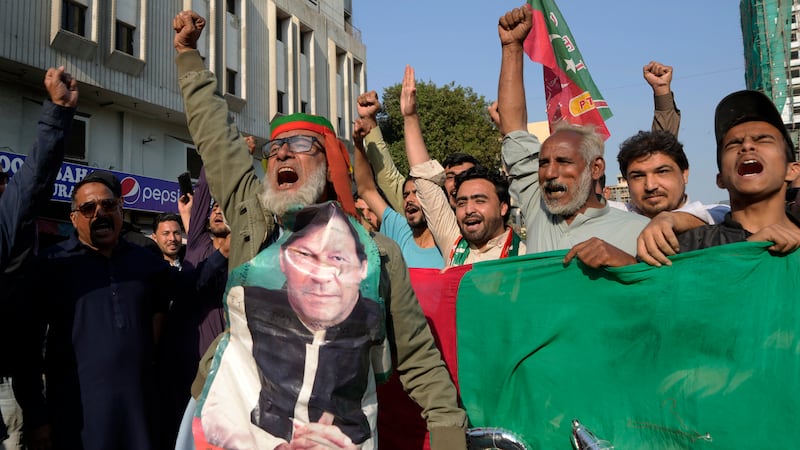 Supporters of Pakistan’s former prime minister Imran Khan’s Pakistan Tehreek-e-Insaf party chant slogans during a protest against alleged vote-rigging (AP Photo/Fareed Khan)
