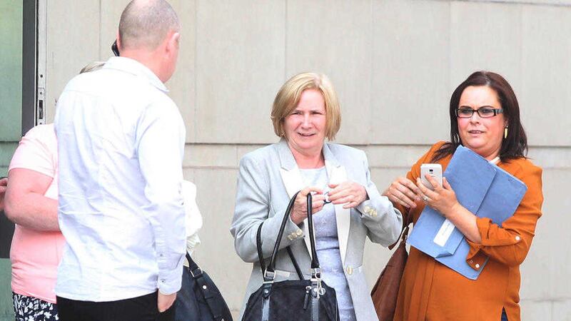 Eileen Hall (middle) leaving Laganside courts in June after having a charge of common assault dismissed. Picture by Matt Bohill 