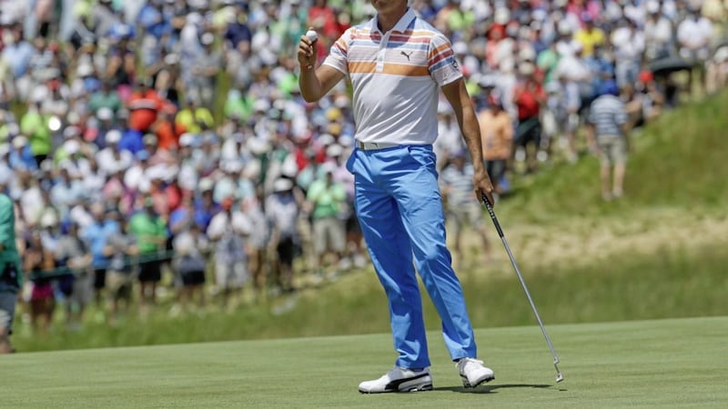 Rickie Fowler acknowledges the crowd after his fine opening 65