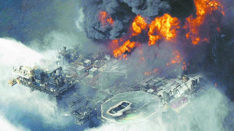 A 2010 file photo taken in the Gulf of Mexico more than 50 miles southeast of Venice on Louisiana&#39;s tip shows the Deepwater Horizon oil rig burning 