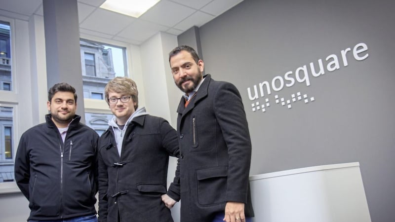 Unosquare&#39;s chief executive Giancarlo Di Vece (left) with site lead Mark Brown and vice-president of finance Eduardo Arias 