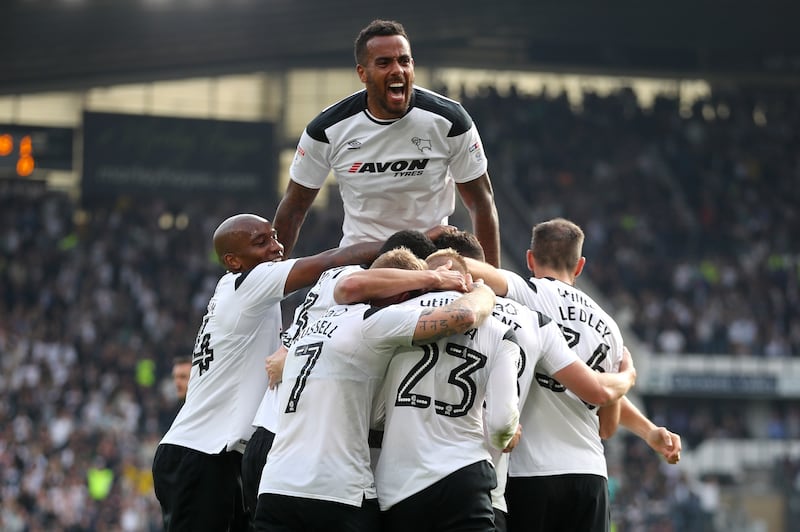 Derby County players celebrate a goal