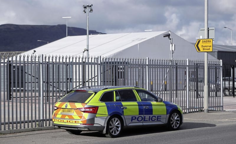 PIXELLATION BY PA PICTURE DESK..Police on duty at the Department of Agricultural, Environment and Rural Affairs facility on Duncrue Street near Belfast Harbour, as post-Brexit checks at all Northern Ireland&#39;s ports resume. Inspections of animal-based food produce arriving at Belfast and Larne ports were suspended amid concerns over the safety of staff. Picture date: Wednesday February 10, 2021. PA Photo. See PA story POLITICS Brexit. Photo credit should read: Niall Carson/PA Wire. 
