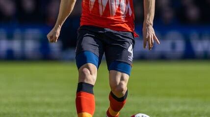 Tom Lockyer has agreed a new contract with Luton (Steven Paston/PA)