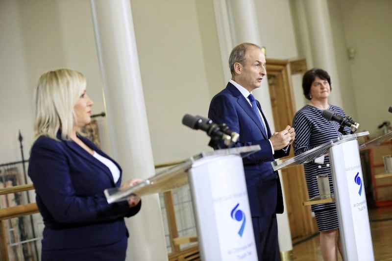 Then Deputy First Minister Michelle O&#39;Neill. Taoiseach Miche&aacute;l Martin and First Minister Arlene Foster speak after a North South Ministerial Council meeting in Dublin Castle in 2020 