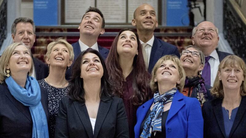Back row from left, Chris Leslie, Gavin Shuker, Chuka Umunna and Mike Gapes, (middle row, left to right) Angela Smith, Luciana Berger and Ann Coffey, front row, from left Sarah Wollaston, Heidi Allen, Anna Soubry and Joan Ryan - part of The Independent Group 
