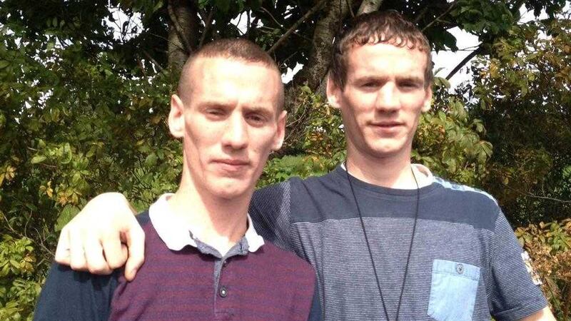Murder victim Gerard Quinn, left, with his twin brother Michael who was also injured in the altercation 
