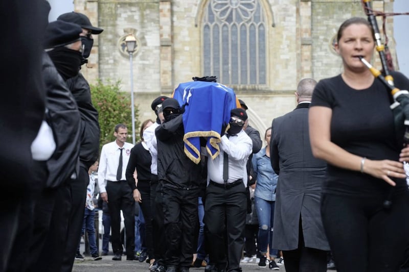 The Funeral of Martin McElkerney on the way into his home in west Belfast