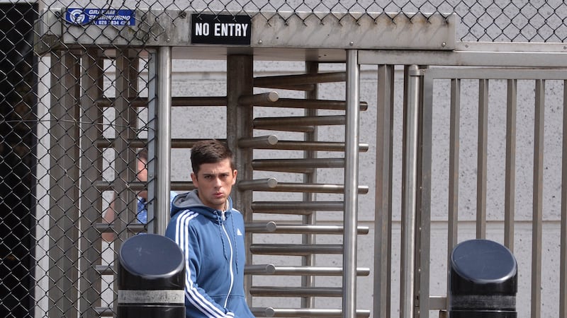 Christopher O'Neill (25) leaves court after an earlier appearance