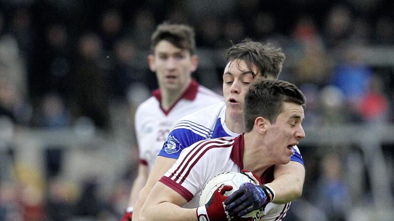 Shane McGuigan takes on the Cavan Gaels defence during Sunday&#39;s Ulster club final. He, like all of his team-mates, hasn&#39;t always had it his own way in the maroon and white. 