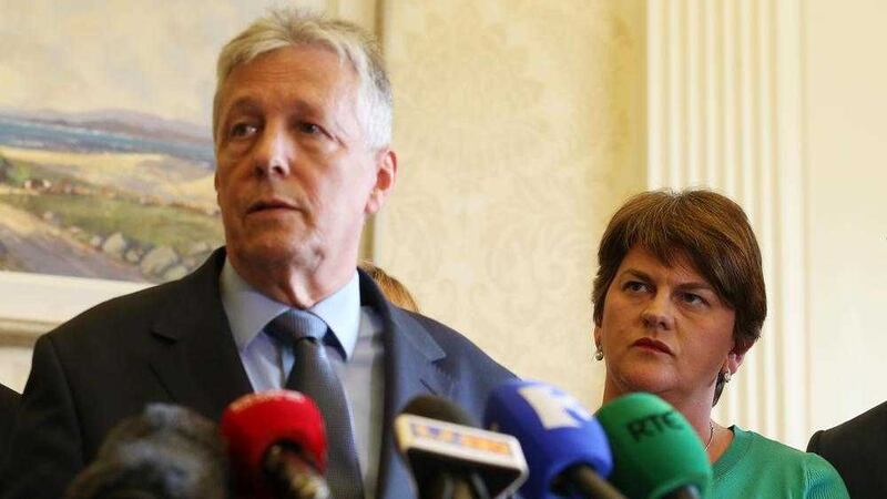 The gatekeeper and the gate - finance minister, acting first minister and gatekeeper Arlene Foster and in/out first minister Peter Robinson. Picture by Mal McCann 