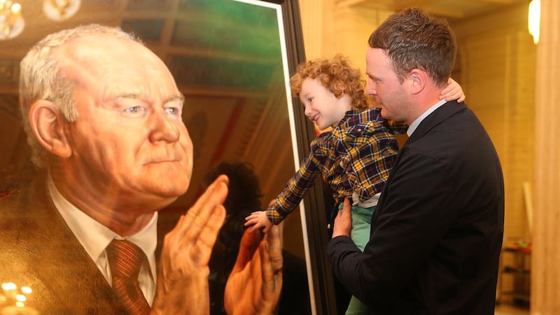 &nbsp;Martin McGuinness son Fiachra and grandson Dulta at the unveiling of the portrait of the former deputy First Minister at Parliment Buildings. Picture by Mal McCann