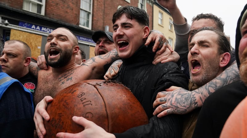 Players take part in the 824th Atherstone Ball Game in Atherstone, Warwickshire
