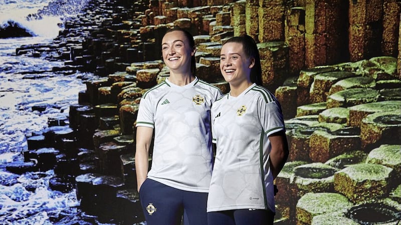 Northern Ireland internationals Lauren Wade and Megan Bell wear the new women's away kit.