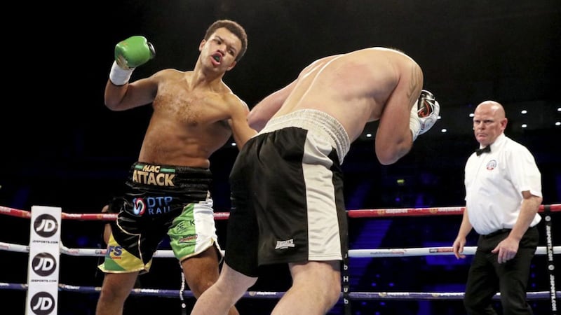 Throwing leather for a livin&#39;. Tommy McCarthy and Peter Hegyes in action during their Cruiserweight bout at the SSE Arena 