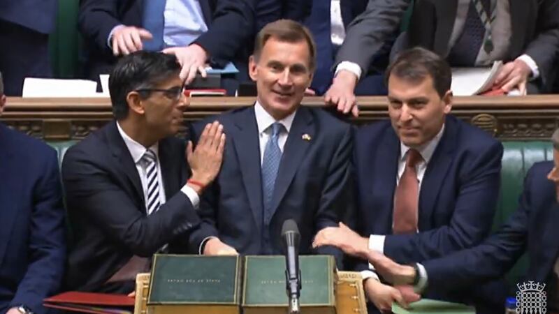British prime minister Rishi Sunak congratulates Chancellor of the Exchequer Jeremy Hunt after he delivered his autumn statement to MPs in the House of Commons, London. Picture date: Thursday November 17, 2022. Picture by PA Wire