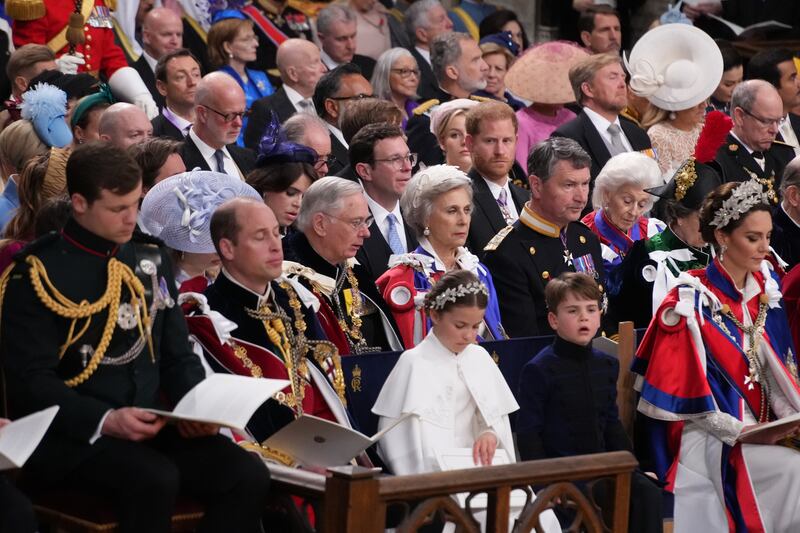 Harry in the third row behind the Waleses, the Duke and Duchess of Gloucester and Vice Admiral Timothy Laurence during the coronation ceremony