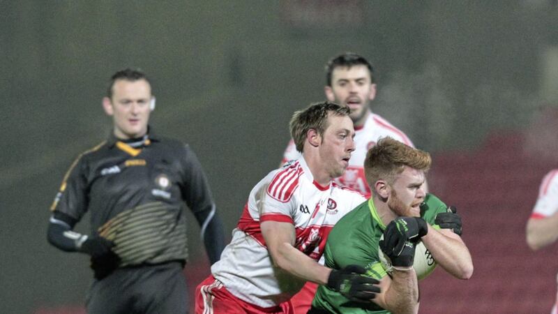 Derry&#39;s Neil Forrester tangles with Aaron Morgan of Queen&#39;s during Wednesday night&#39;s Dr McKenna Cup win 
