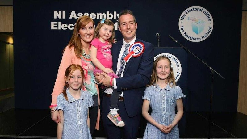 The DUP's Paul Givan, pictured with his wife Emma and children, was the first candidate elected in Lagan Valley. Picture by Mal McCann