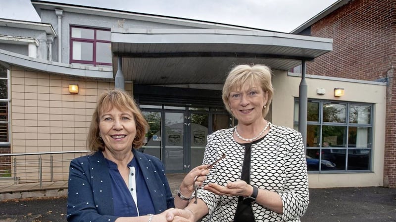 Professor Terri Scott (right), principal and chief executive of Northern Regional College accepts the keys of St Joseph&rsquo;s College in Coleraine from retiring principal Mrs Mary Millar 
