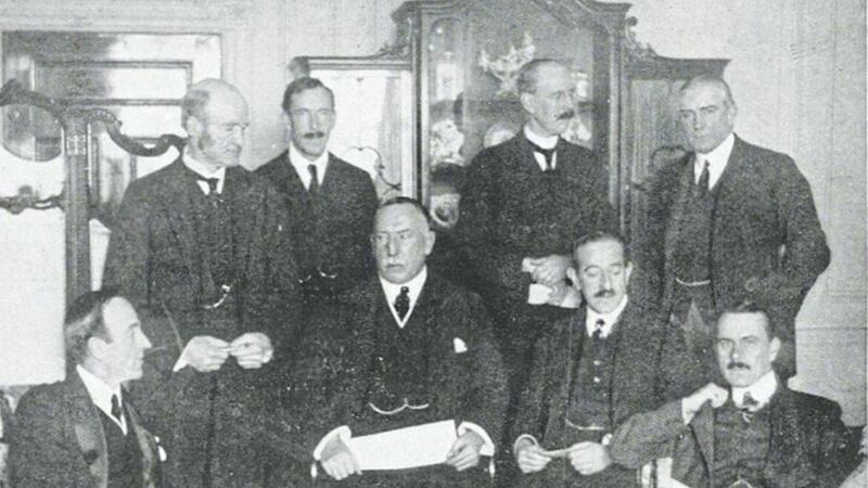 Pictured is James Craig (centre), the first Prime Minister of Northern Ireland, with members of his cabinet in 1921. 