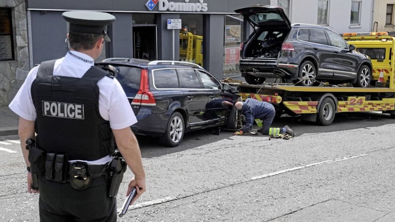 Police at the scene of the crash on Dungannon Street in Dungannon. Picture by Justin Kernoghan/ PhotopressBelfast 