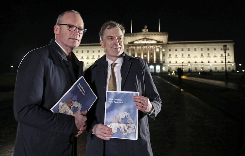 Simon Coveney and Julian Smith unveil the New Decade New Approach agreement. Picture by Niall Carson/PA Wire 