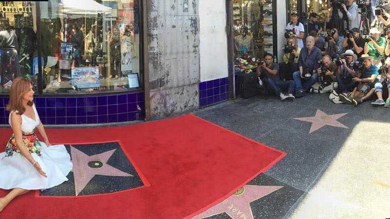 &nbsp;Roma Downey beside her star on the Hollywood Walk of Fame in Los Angeles yesterday