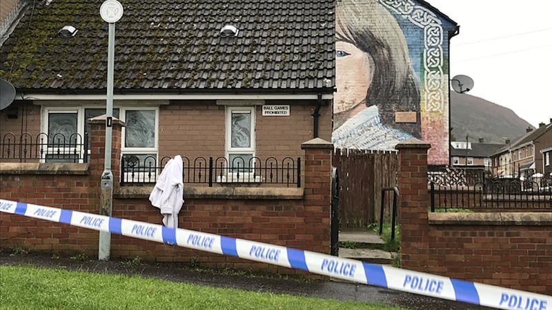 The scene at Norglen Road in west Belfast after a man was shot in a paramilitary-style attack&nbsp;