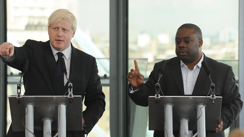 Boris Johnson, then mayor of London, holds a news conference with Ray Lewis