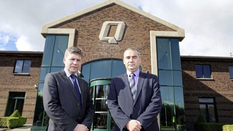 Outside the Quinn Industrial Holdings Group base in Derrylin are operations director Kevin Lunney (left) and chief executive Liam McCaffrey 