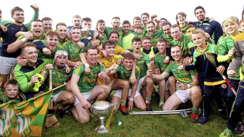The Dunloy players celebrate their Antrim championship success after defeating Cushendall in Ballycastle 12 days ago. Picture by Seamus Loughran 