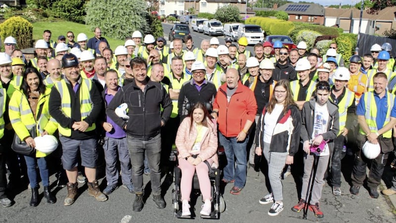 DIY SOS team with volunteers and McCreight family from Bangor 