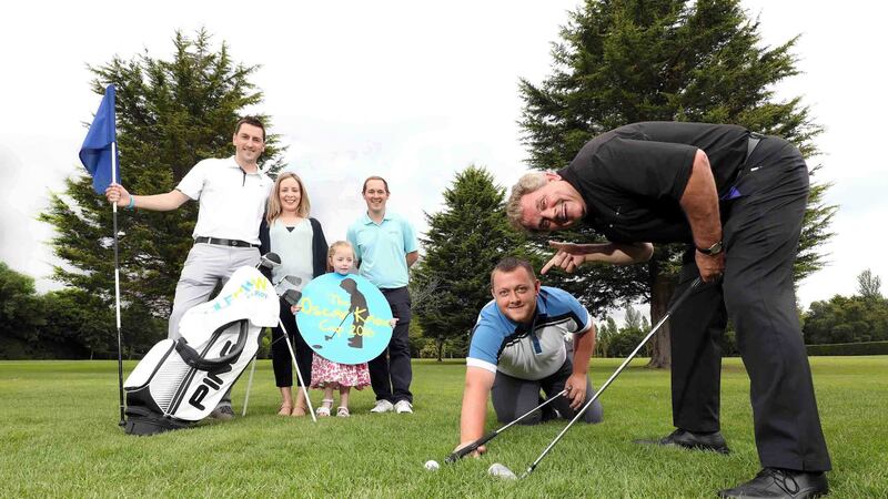 Getting ready for the event at Fortwilliam Golf Club are (L-R) Oscar's father Stephen Knox, mother Leona Knox, sister Isobella Knox, Andrew Hollywood of GolfNow, snooker player Mark Allen and sports commentator Adrian Logan
