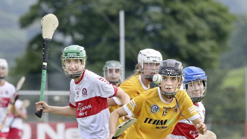 Derry&#39;s Caoimhe Glass (left) got through a lot unseen work according to her manager Martin Coulter in their All-Ireland Intermediate Championship win over Cork at the weekend Picture Margaret McLaughlin. 