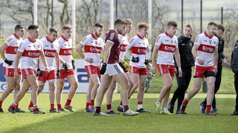 Derry manager Rory Gallagher and his team on the way to the changing rooms at half time against Galway during the National Football League match played at Owenbeg on Sunday 20th March 2022. Oisin McWilliams (11) who was later injured, on left of him. Picture Margaret McLaughlin. 