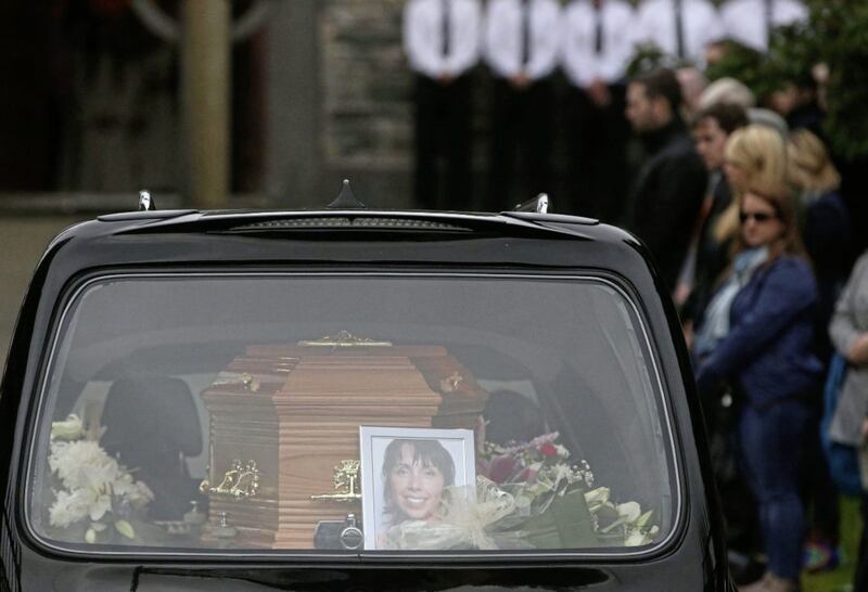 The hearse carrying the coffin of Clodagh Hawe arrives at Saint Mary's Church in Castlerahan, Co Cavan. She and her three sons were killed by her husband Alan who then died by suicide