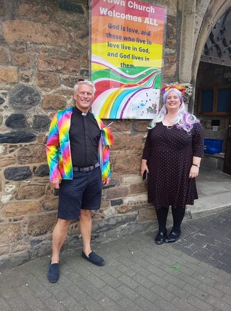 Ruth Abernethy and the Reverend Matthew Barrett in front of the Town Church, Guernsey