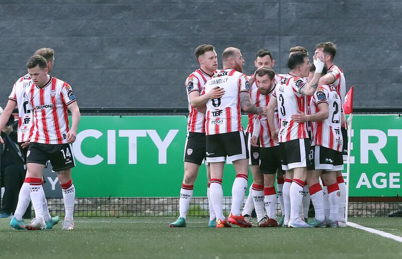Derry City goal scorer Paul McMullan is mobbed after scoring against Shelbourne at the Brandywell on Monday night. Picture: Margaret McLaughlin
