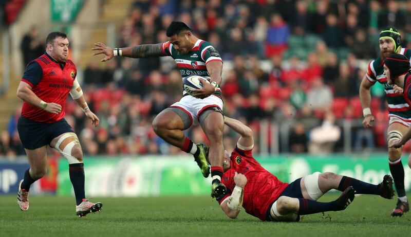 Leicester Tigers Manu Tuilagi is tackled by Munster's Peter O'Mahony during the European Champions Cup, pool one match at Welford Road, Leicester.&nbsp;