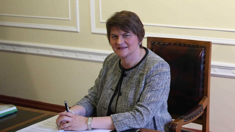 Arlene Foster takes charge of the Office of the First Minister at Stormont.&nbsp;Picture by Brian Lawless, PA Wire&nbsp;