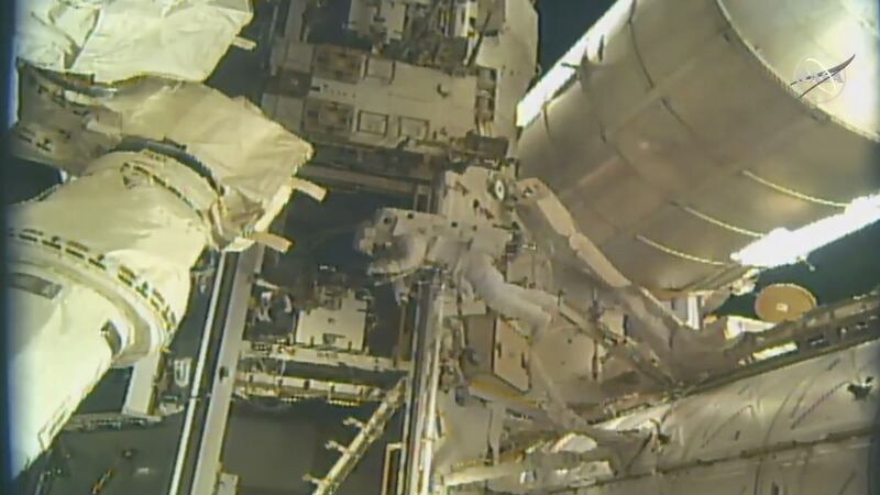 Nick Hague and Andrew Morgan had to deal with multiple cables to install a docking port delivered by SpaceX last month.