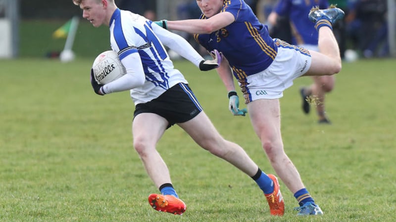 Cian Boylan of St Patrick&rsquo;s, Cavan tries to stop Maghera&rsquo;s Enda Downey launching an attack during the Group B draw between the sides earlier this week. The Breffni side will hope to take heart from that result and performance when they take on St Macartan&rsquo;s, Monaghan in their final group game in Clones on Friday Picture by Jim Dunne