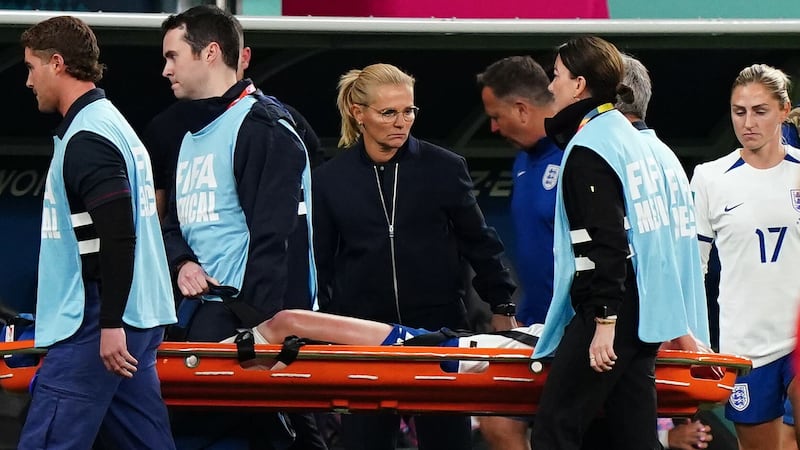 Sarina Wiegman looks on as Keira Walsh is carried off on a stretcher (Zac Goodwin/PA)