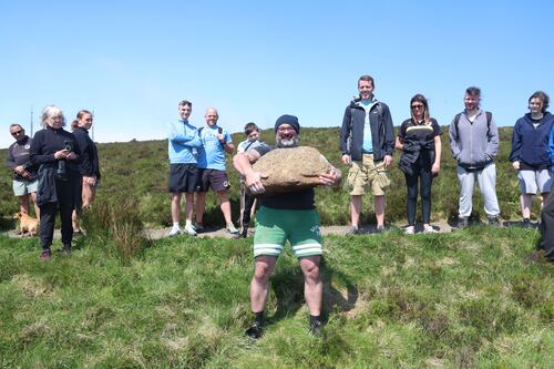 ‘Lost tradition’ of stone lifting celebrated in hills above Belfast