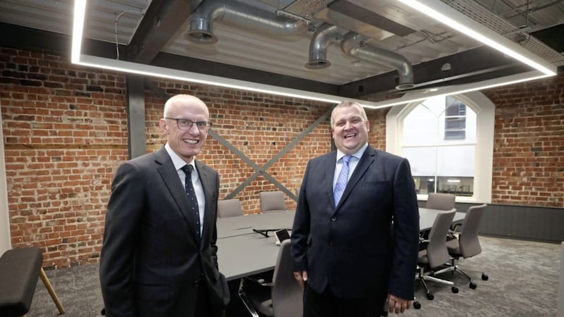 At the firm&#39;s new Belfast offices are Kevin Thompson, CEO of RSA Insurance Ireland, and Tim Graham, managing director of RSA Northern Ireland. Picture: Kelvin Boyes/Press Eye 