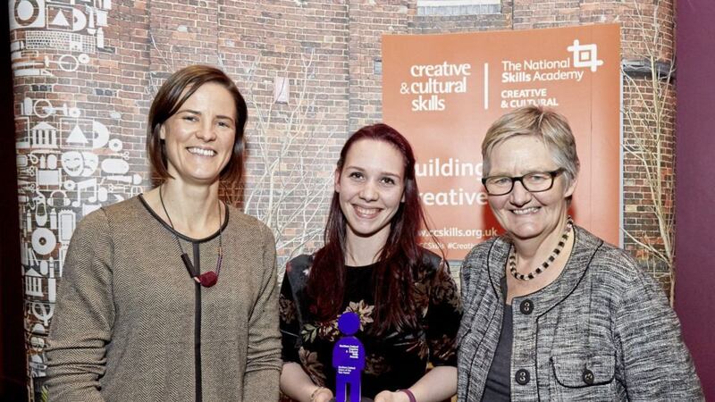 Northern Ireland Intern of the Year Rachael Garrett (centre), a preventive conservation intern with the National Trust, receives her award from Sara Graham, nations director of Creative &amp; Cultural Skills and Pauline Tambling, chief executive of Creative &amp; Cultural Skills. 